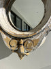 Mirrored Oeil-de-Boeuf window