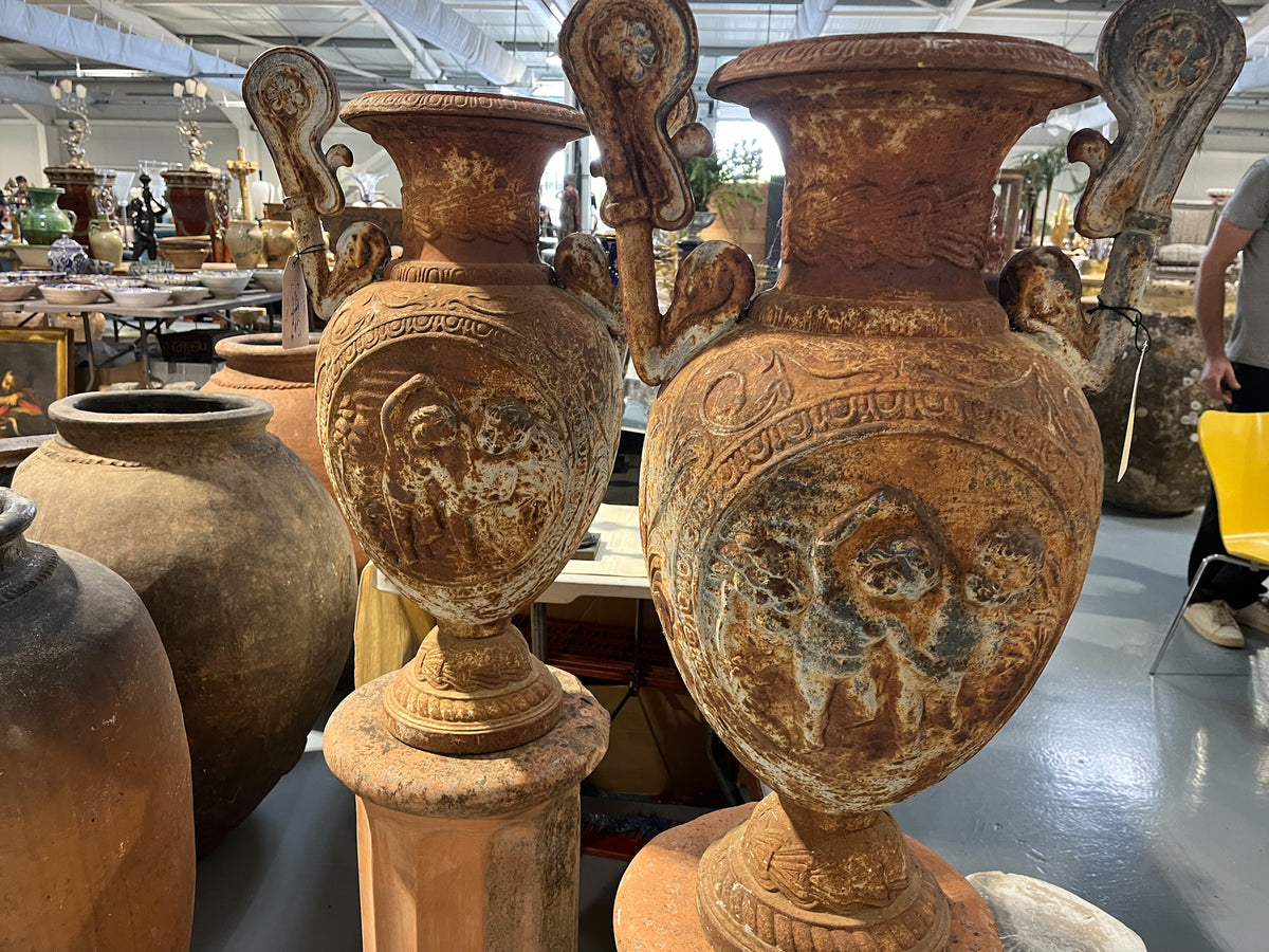 Cast iron Medici style urn pair