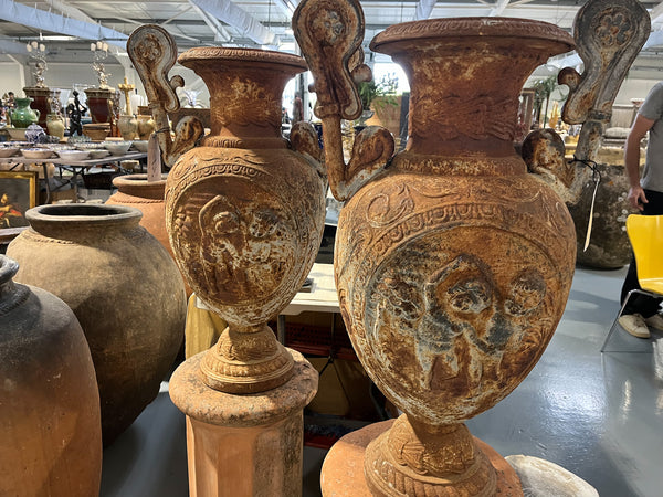 Cast iron Medici style urn pair